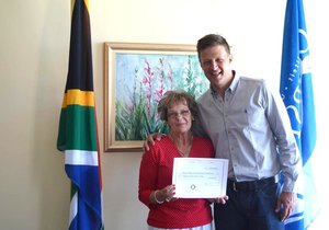 Skinstad presents Mayor with proceeds from Golf Challenge